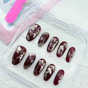 zb33..A variety of almond-shaped and square nails.
