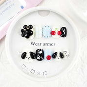 zb55..A display board featuring 24 different styles of fashionable nail wear.