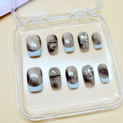 zb65..A display board featuring 24 different styles of fashionable and trendy nail art.