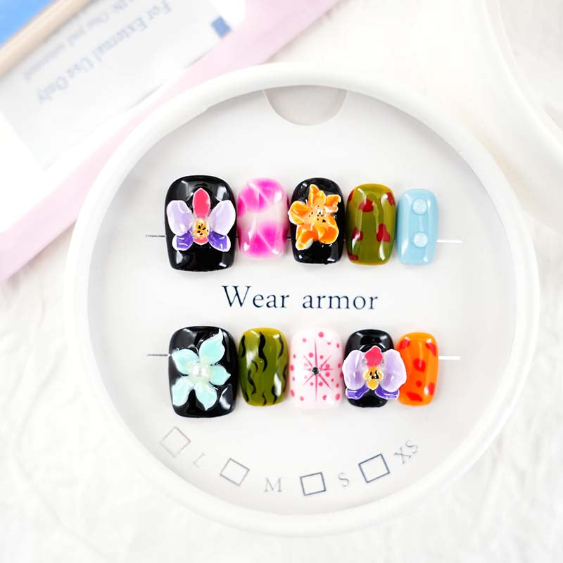 zb55..A display board featuring 24 different styles of fashionable nail wear.