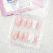 zb33..A variety of almond-shaped and square nails.