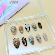 zb59..There are display boards featuring 24 different styles and designs of fashionable and trendy nail wear.