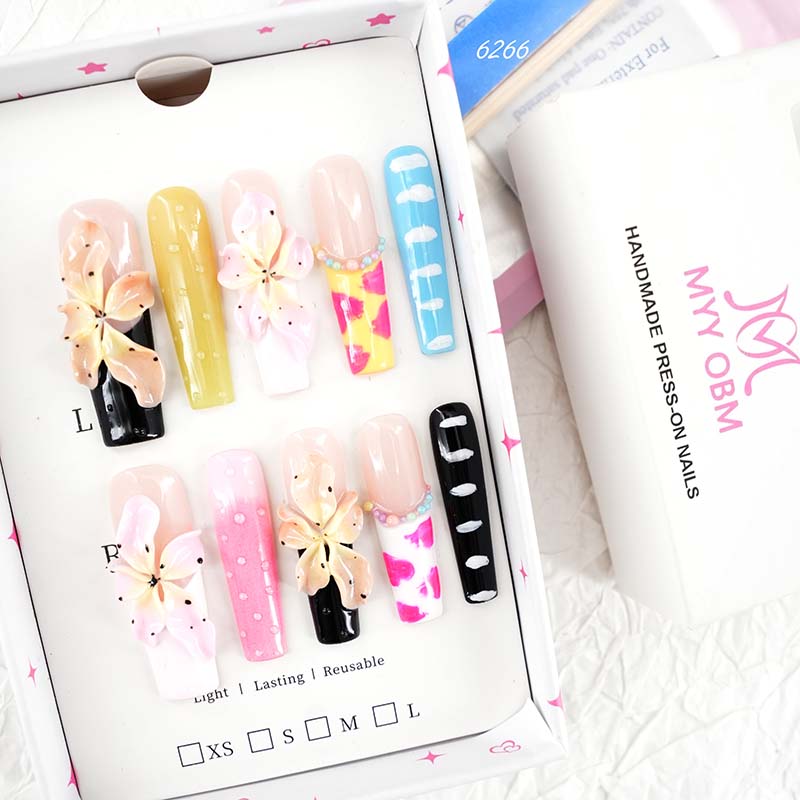 zb67..A display board featuring 24 beautiful and distinct styles of nail art.