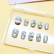 zb72..A display board featuring 24 beautiful and distinct styles of nail art.