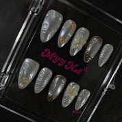 zb98..Nails of various styles.