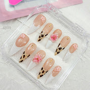 zb34..A collection of almond-shaped and square-shaped wearable nails