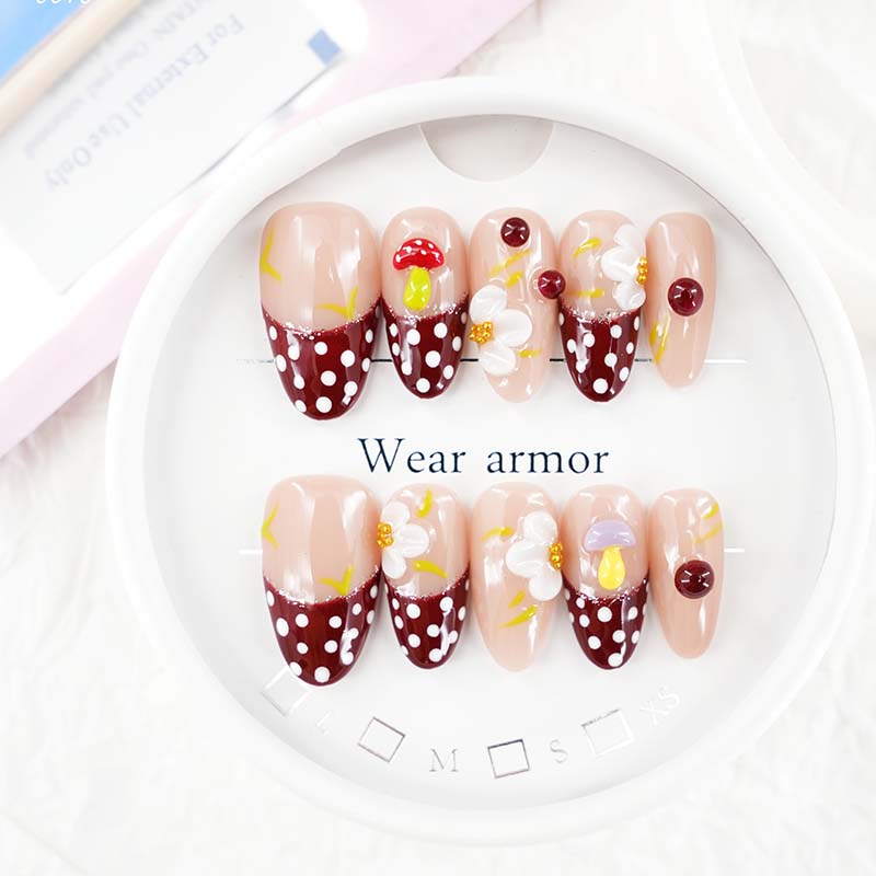 zb55..A display board featuring 24 different styles of fashionable nail wear.