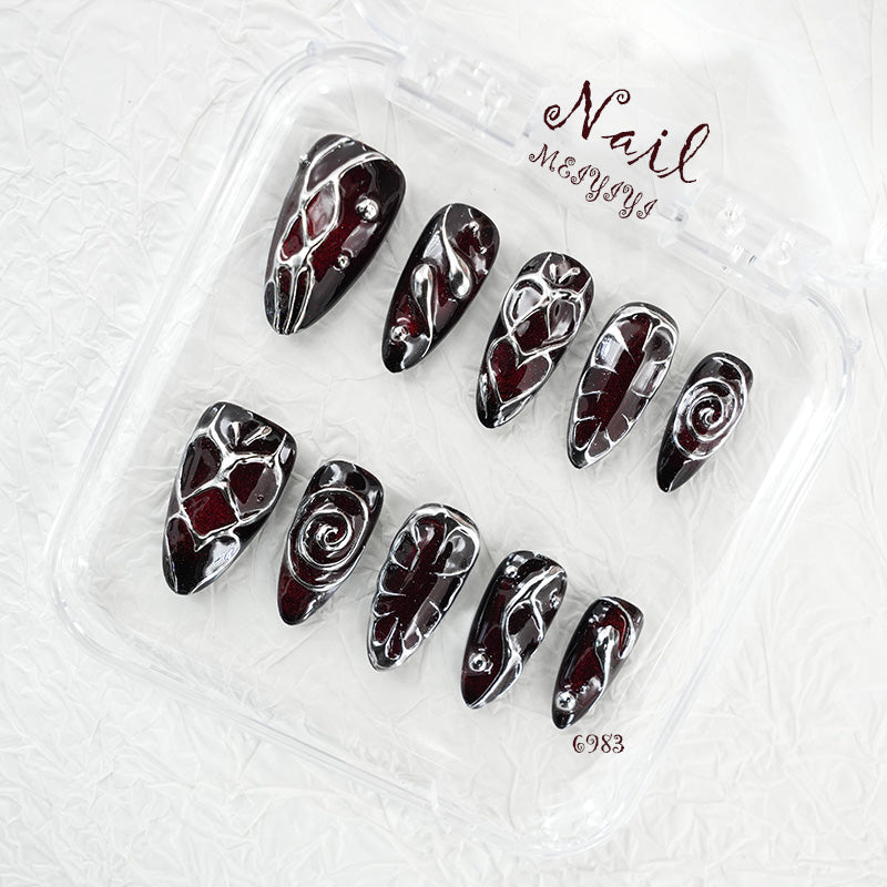 zb98..Nails of various styles.