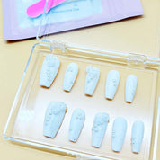 zb65..A display board featuring 24 different styles of fashionable and trendy nail art.