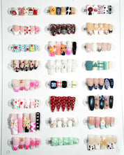 zb67..A display board featuring 24 beautiful and distinct styles of nail art.