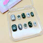zb65..A display board featuring 24 different styles of fashionable and trendy nail art.
